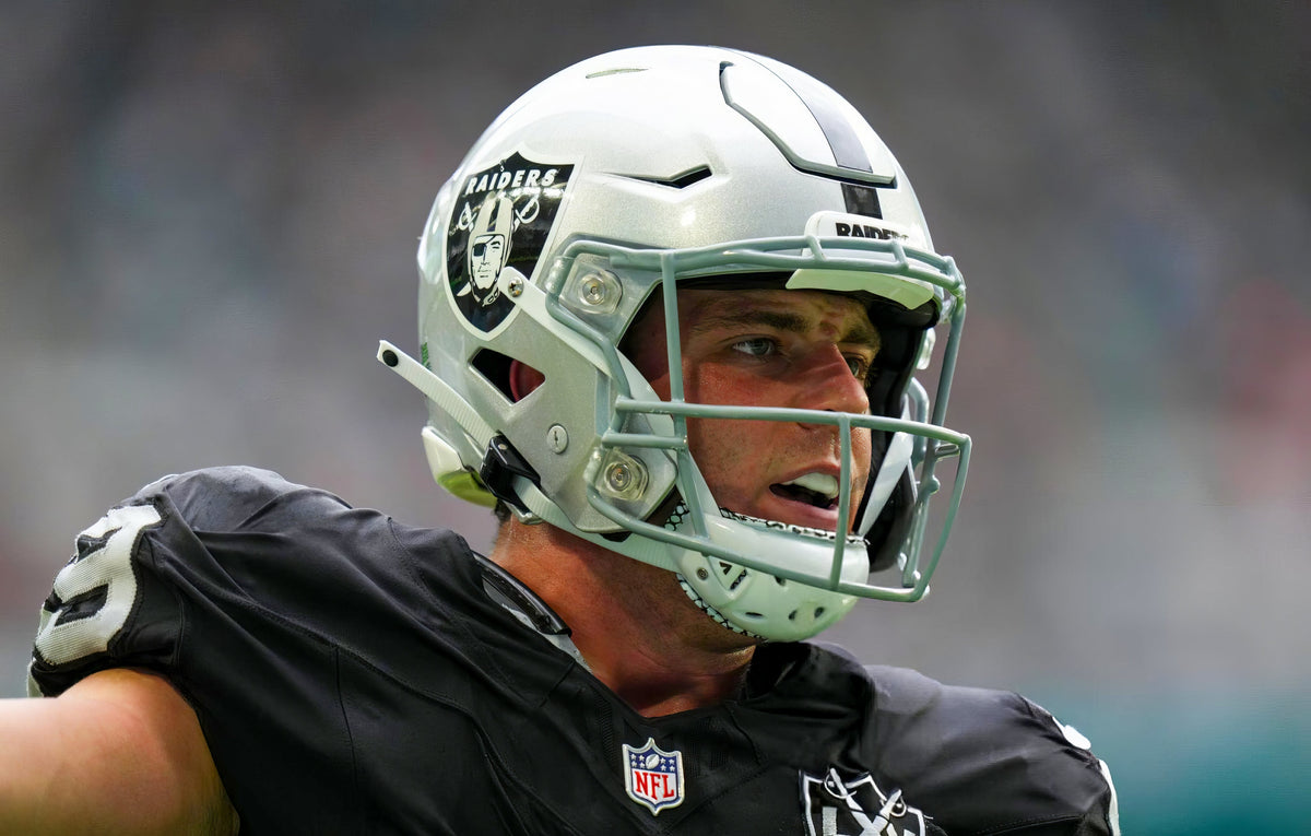Football player wearing a TRUFIT mouthguard