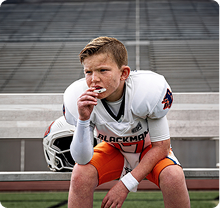Youth athlete wearing TRUFIT mouthguard